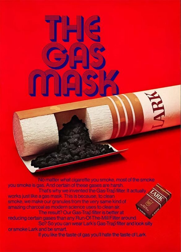 Bright red Lark cigarette advertisement showing a cutaway cigarette filled with dark charcoal granules beneath the headline “The Gas Mask.”